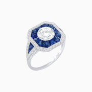 Art Deco Inspired Round Center Octagonal Calibré-Cut Halo Engagement Ring - Shahin Jewelry